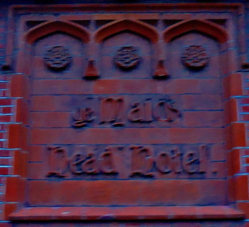 The Maids Head has a very old name sign worked into the building itself